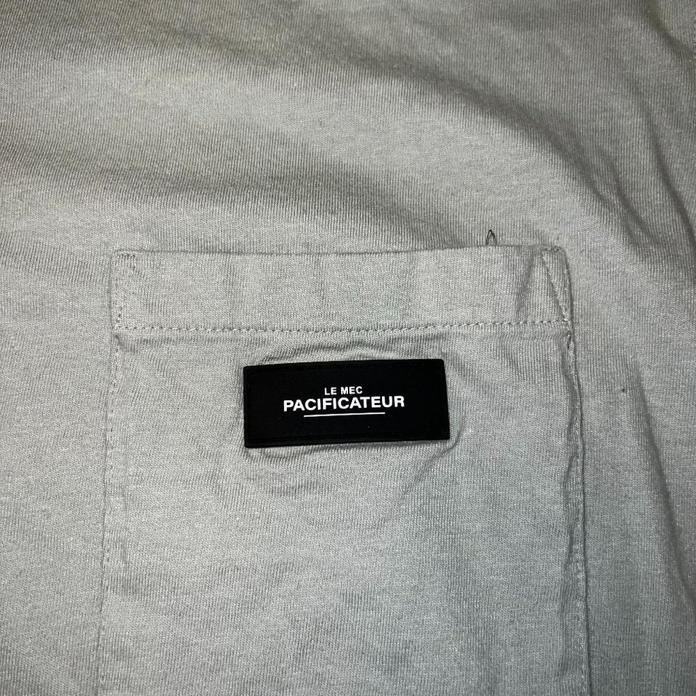 H & M Le Mec Pacifacteur Pocket T-Shirt